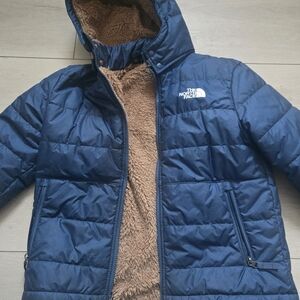 The North Face Blue Puffer Jacket with Brown Lining